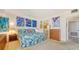 Spacious bedroom with a king-size bed and ensuite access at 1932 Harbourside Dr # 232, Longboat Key, FL 34228