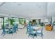 Relaxing community room with seating and tables at 1932 Harbourside Dr # 232, Longboat Key, FL 34228