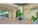 Lobby with elevator access and tropical mural at 1932 Harbourside Dr # 232, Longboat Key, FL 34228