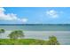 Expansive view of the water, featuring lush greenery at 1932 Harbourside Dr # 232, Longboat Key, FL 34228