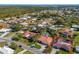 Aerial view showcasing a single-story home with pool at 468 Leger Dr, Nokomis, FL 34275