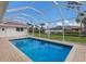 Relaxing screened-in pool with backyard view at 468 Leger Dr, Nokomis, FL 34275