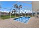 Inviting screened-in pool with a large patio area at 468 Leger Dr, Nokomis, FL 34275