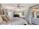 Spacious main bedroom with king-size bed and en-suite bathroom at 4720 Oak Forest W Dr # 57, Sarasota, FL 34231