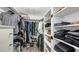 Spacious walk-in closet with ample shelving and hanging space at 4720 Oak Forest W Dr # 57, Sarasota, FL 34231