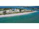 Aerial view of beachfront property with resort and beach at 50 Lighthouse Point Dr, Longboat Key, FL 34228