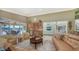 Bright and airy Gathering room with water views and comfortable seating at 50 Lighthouse Point Dr, Longboat Key, FL 34228