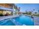 Stunning pool and spa overlooking the water at 50 Lighthouse Point Dr, Longboat Key, FL 34228