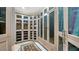 Spacious walk-in closet with ample storage at 50 Lighthouse Point Dr, Longboat Key, FL 34228