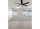 Spacious bedroom with ceiling fan and ample natural light at 5316 Rocky Coast Place, Palmetto, FL 34221