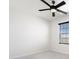 Bedroom with ceiling fan and window offering natural light at 5316 Rocky Coast Place, Palmetto, FL 34221