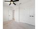 Spacious bedroom with double doors and carpet flooring at 5316 Rocky Coast Place, Palmetto, FL 34221