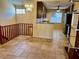 Spacious dining area with tile floors and kitchen access at 5405 Fair Oaks St # 5405, Bradenton, FL 34203