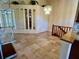 Open dining area with tile flooring and glass shelving at 5405 Fair Oaks St # 5405, Bradenton, FL 34203