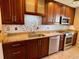 Updated kitchen with granite countertops and stainless steel appliances at 5405 Fair Oaks St # 5405, Bradenton, FL 34203