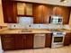 Modern kitchen featuring granite countertops and updated cabinetry at 5405 Fair Oaks St # 5405, Bradenton, FL 34203