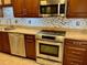 Kitchen features stainless steel appliances and a granite countertop at 5405 Fair Oaks St # 5405, Bradenton, FL 34203