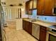 Granite countertops and stainless steel appliances highlight this kitchen at 5405 Fair Oaks St # 5405, Bradenton, FL 34203