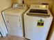 Laundry room with matching white washer and dryer at 5405 Fair Oaks St # 5405, Bradenton, FL 34203