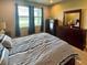 Main bedroom with ensuite and lake view at 7926 111Th E Ter, Parrish, FL 34219