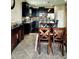 Kitchen dining area with wood table and chairs at 7926 111Th E Ter, Parrish, FL 34219