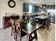 Kitchen dining area with wood table and chairs at 7926 111Th E Ter, Parrish, FL 34219