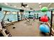 Well-equipped fitness center with various exercise machines and free weights at 7926 111Th E Ter, Parrish, FL 34219