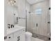 Clean bathroom with walk-in shower and white vanity at 8372 Sea Glass Ct, Sarasota, FL 34240