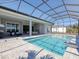 Inviting swimming pool with a screened enclosure at 8372 Sea Glass Ct, Sarasota, FL 34240