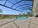 Large screened-in pool and spa with tranquil views at 8372 Sea Glass Ct, Sarasota, FL 34240