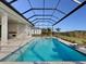 Enjoy this refreshing pool and spa with a screened enclosure at 8372 Sea Glass Ct, Sarasota, FL 34240