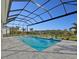 Relaxing screened-in pool and spa with open views at 8372 Sea Glass Ct, Sarasota, FL 34240