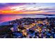 Aerial view of coastal town at sunset at 9393 Midnight Pass Rd # 201, Sarasota, FL 34242