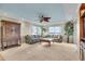 Bright living room with water views and comfortable sofas at 9393 Midnight Pass Rd # 201, Sarasota, FL 34242