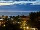 Stunning nighttime ocean view with beachfront homes at 9393 Midnight Pass Rd # 201, Sarasota, FL 34242