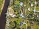 Aerial view showing home, land, and riverfront property at 1285 & 1289 Hagle Park Rd, Bradenton, FL 34212