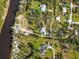 Aerial view showing home, land, and riverfront property at 1285 & 1289 Hagle Park Rd, Bradenton, FL 34212