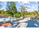 Sandy boat ramp with canoes and safety signage at 1285 & 1289 Hagle Park Rd, Bradenton, FL 34212