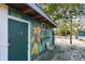 Canoe rental facility with colorful mural and seating at 1285 & 1289 Hagle Park Rd, Bradenton, FL 34212