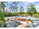 Outdoor storage for canoes, neatly arranged on the sandy riverbank at 1285 & 1289 Hagle Park Rd, Bradenton, FL 34212