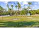 Park-like setting with grassy area and restroom facility at 1285 & 1289 Hagle Park Rd, Bradenton, FL 34212