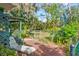 Relaxing brick patio with lounge chair and greenery at 1285 & 1289 Hagle Park Rd, Bradenton, FL 34212