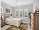 Guest bedroom with a ceiling fan and dresser at 13325 Indigo Way, Bradenton, FL 34211