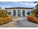 Inviting clubhouse entrance with landscaping at 13325 Indigo Way, Bradenton, FL 34211