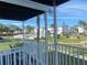 Balcony view of the community pool and surrounding buildings at 2227 Sunset Dr # E-22, Bradenton, FL 34207