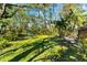 Spacious backyard with lush landscaping and plenty of room to relax at 3901 Balsam Ct, Sarasota, FL 34243