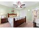 Bright bedroom with wood bed frame and ample closet space at 3901 Balsam Ct, Sarasota, FL 34243