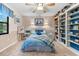 Charming bedroom with built in shelving and window seat at 3901 Balsam Ct, Sarasota, FL 34243