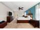 Bright bedroom with ensuite bathroom access and a king-size bed at 3901 Balsam Ct, Sarasota, FL 34243