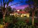 Lovely house with a lush garden at sunset at 3901 Balsam Ct, Sarasota, FL 34243